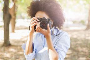 Image result for Bimoji Black Woman Holding Camera