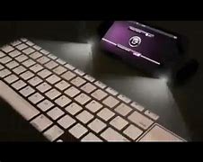Image result for iPhone 6 Projector Keyboard