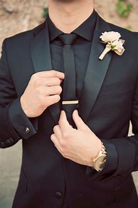Image result for Black Suit Gold Tie