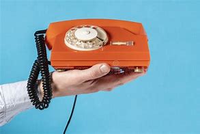 Image result for A Guy Dialing On an Old Rotary Phone