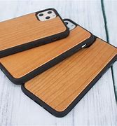 Image result for iPhone 11 On Wood Table