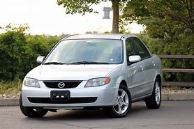 Image result for 2003 Mazda Protege Original New