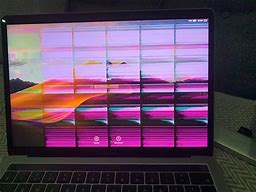 Image result for Vertical Streaks On My MacBook Screen