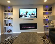 Image result for Built in for TV Next to Fireplace