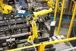 Image result for Robots in Car Factory