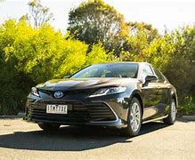 Image result for 2018 Toyota Camry XSE White with Black Top