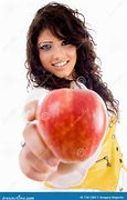 Image result for Female Holding Red Apple with Blury Green Background