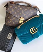 Image result for Gucci and Louis Vuitton