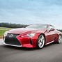 Image result for Tesla Roadster and Lexus LC