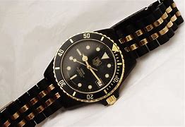 Image result for Tag Heuer Watch Gold Black