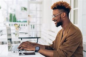 Image result for Black Man Typing On Computer