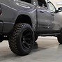 Image result for Black Ram 1500 Lifted