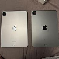 Image result for iPhone SE Silver vs Space Gray