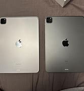 Image result for Silver vs Space Grey iPad Mini 4