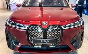 Image result for Aventurin Red BMW IX Front