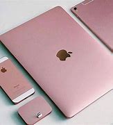 Image result for Laptop with iPhone and One Plus