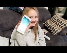 Image result for 8 Year Old with iPhone