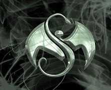 Image result for Tech N9ne Strange Music Logo.jpg