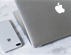 Image result for Picture of a MacBook and a iPhone