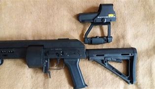 Image result for M and P Shield 9Mm Red Dot