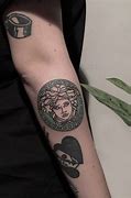 Image result for Versace Logo Tattoo