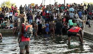 Image result for Migrants Crossing River
