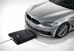 Image result for wireless vehicle charger bmw