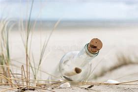Image result for Glass Bottle with Cork in Sand