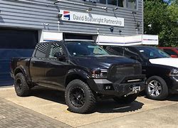 Image result for Ram 1500 4 Inch Lift Stock Wheels