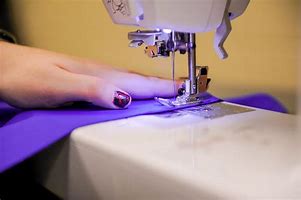 Image result for Using a Sewing Machine