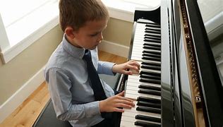 Image result for Playing Piano White