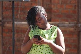 Image result for Girl Holding a Phone