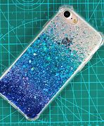 Image result for iPhone 13 Pro Max Blue and Glitter Case