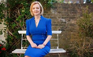 Image result for Liz Truss Beach Holiday