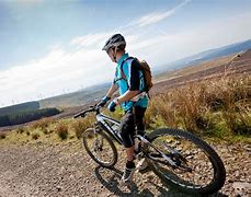 Image result for Person Mountain Biking