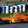 Image result for Neon Orange Race Car