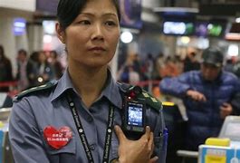 Image result for Chinese Police Officer with Facial Recognition