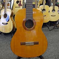 Image result for Yamaha C40 Acoustic Guitar