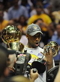 Image result for Kobe Bryant Holding NBA Trophy