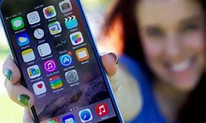 Image result for iPhone 6s Plus Space Grey Size in Hand
