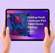 Image result for Holding Up iPad