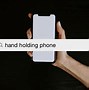 Image result for Raiasing Hand Holding Phone