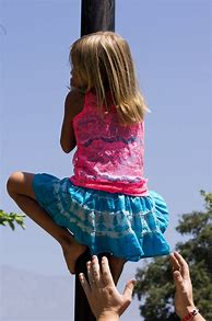 Image result for Little Girl Climbing Lamp Post