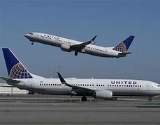 Image result for United Airlines Plane Taking Off
