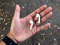 Image result for iPhone 11 with AirPods