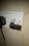 Image result for Pic of Burnt Charger and Socket
