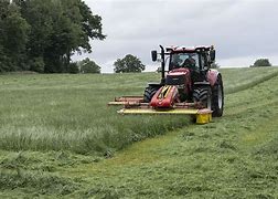 Image result for Mowing Tractor