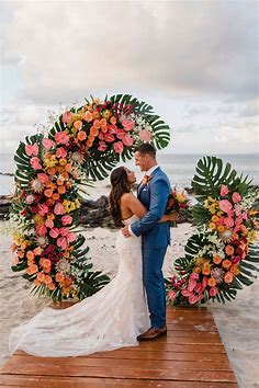 Tropical Hawaiian Elopement | Big Island of Hawai'i | Fairmont Orchid | Tropical wedding centerpieces, Tropical wedding flowers, Hibiscus wedding