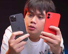 Image result for iPhone 12 Black in Hand