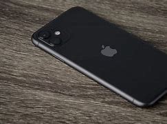 Image result for iPhone 11 with Grab